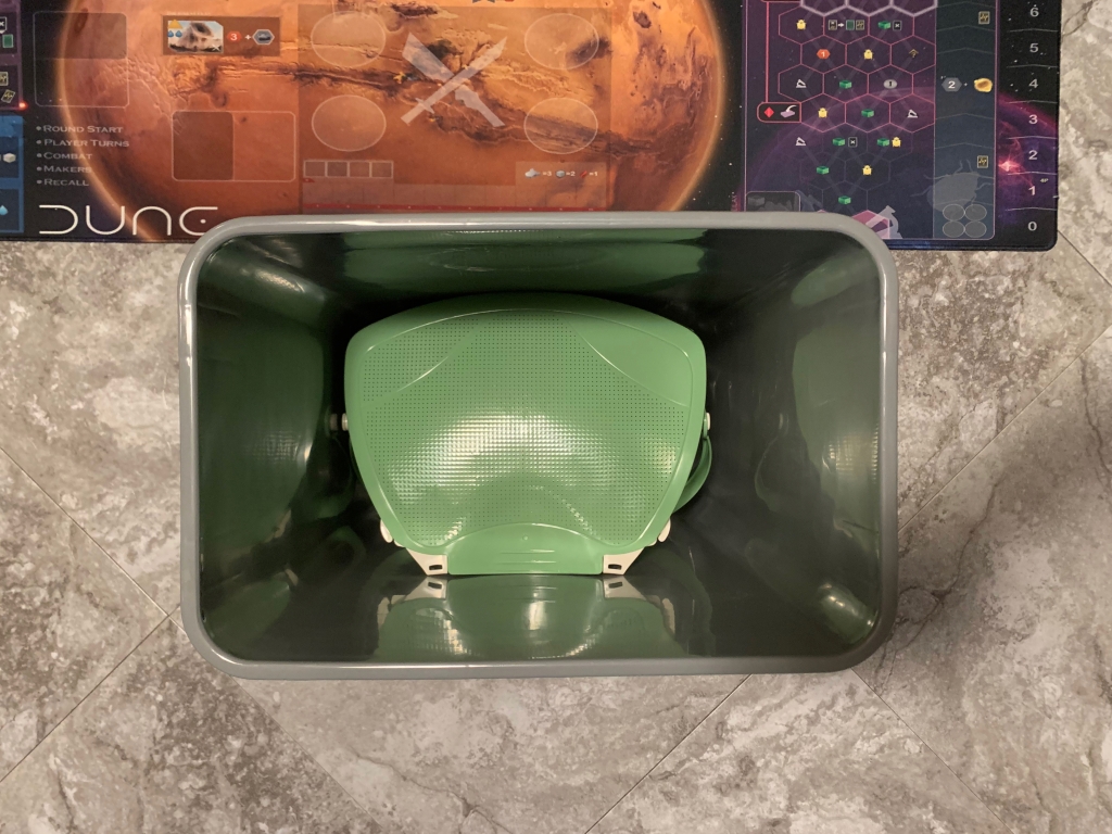 A small compost bin sits inside a normal-sized kitchen bin.